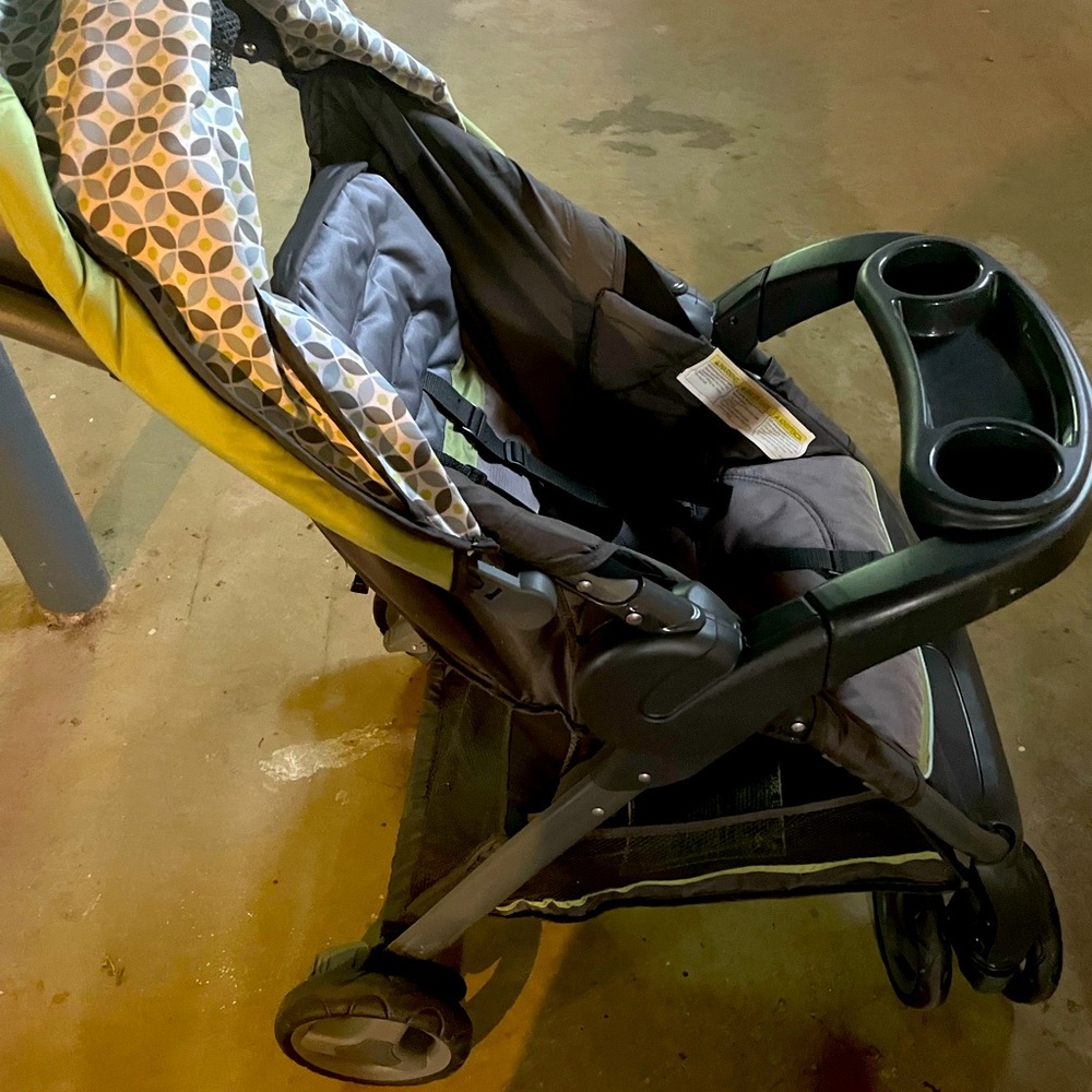 Graco baby stroller! Grey with a little lime green detailing.